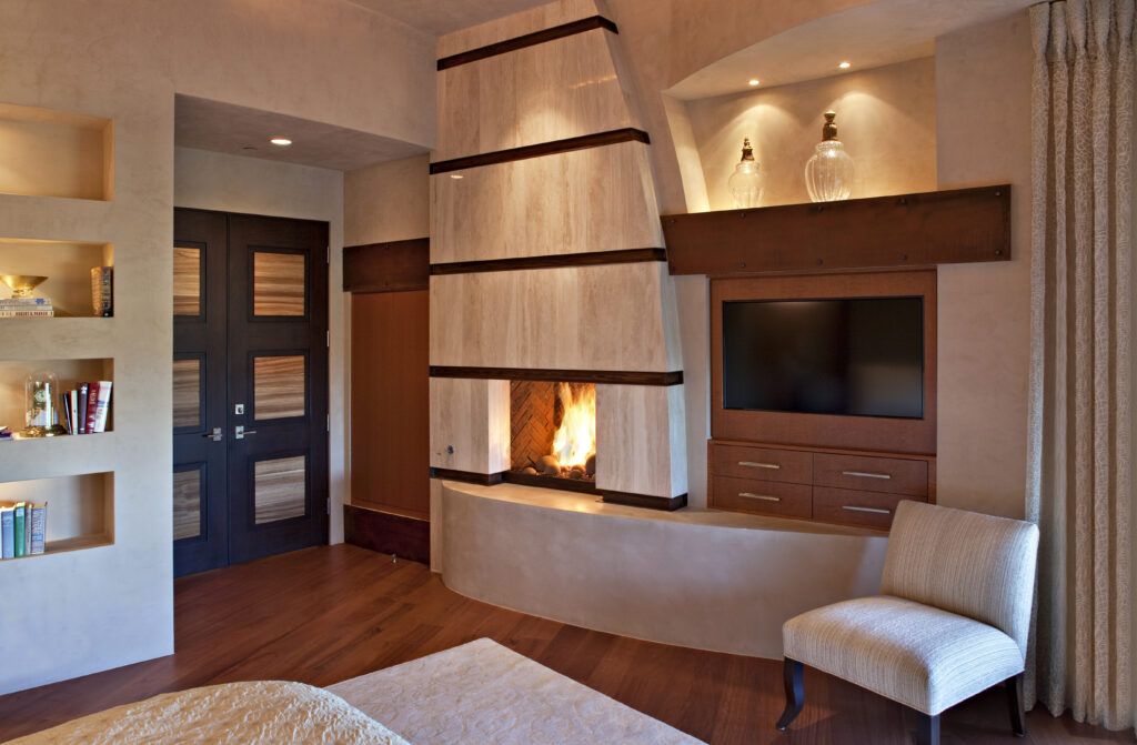 The Phil Nichols Company | Contemporary Southwest | Fireplace with Shelves and Lighting