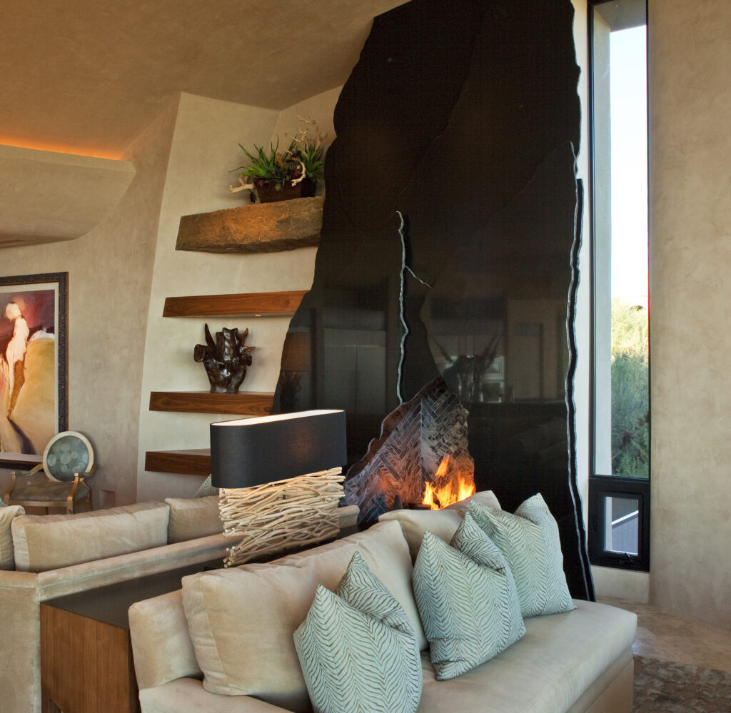 The Phil Nichols Company | Contemporary Southwest | Stone Fireplace with Floating Shelves