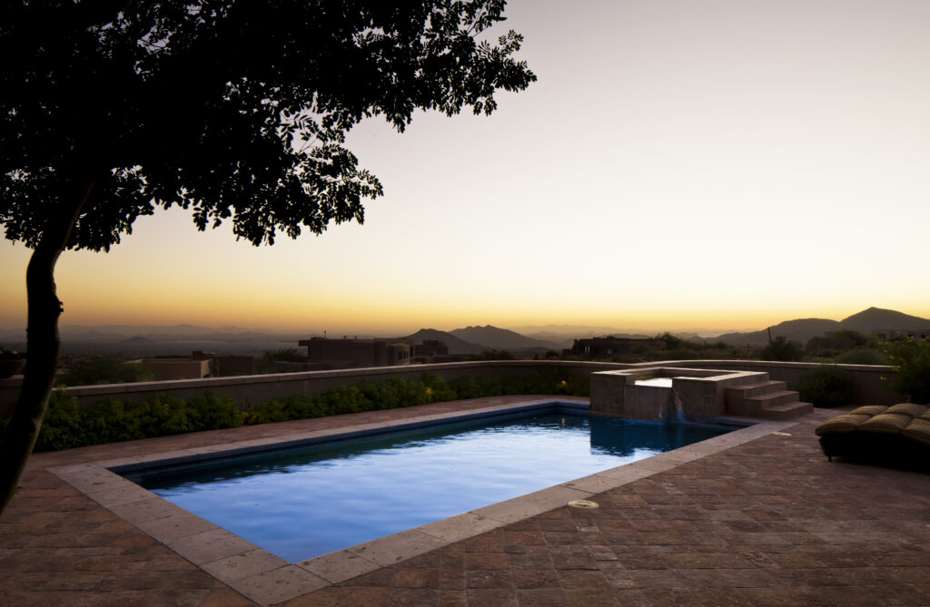 The Phil Nichols Company | Mediterranean Villa | Pool in the Evening