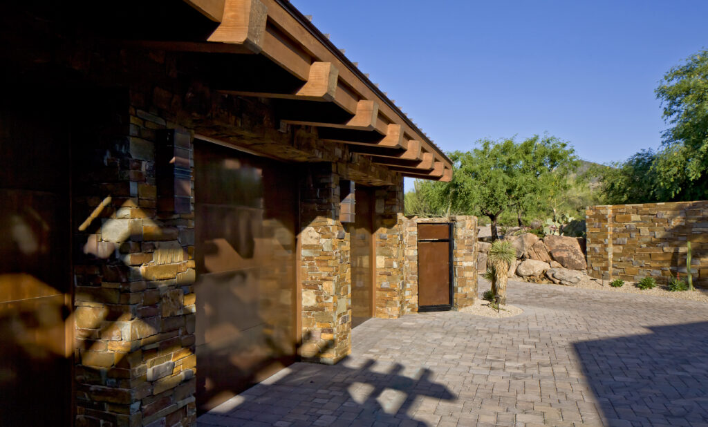 The Phil Nichols Company | Desert Lodge | Garage Doors and Driveway